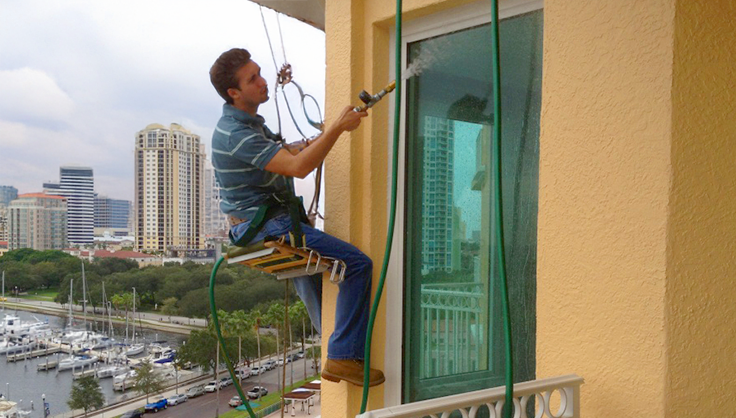 A BMC Technicians Rappels Down A High Rise Condominium in St. Petersburg, Florida.